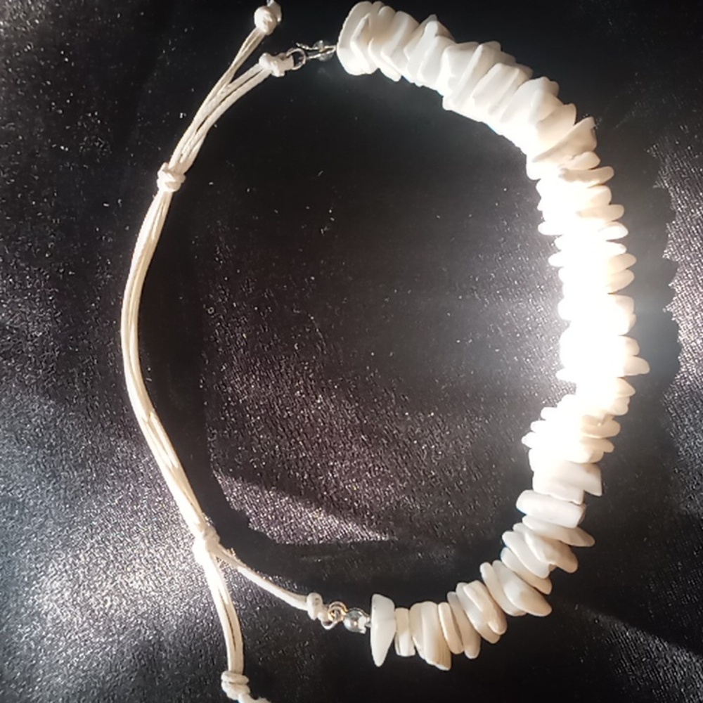 Shell anklet bracelet slide. While shell ankle bracelet.
